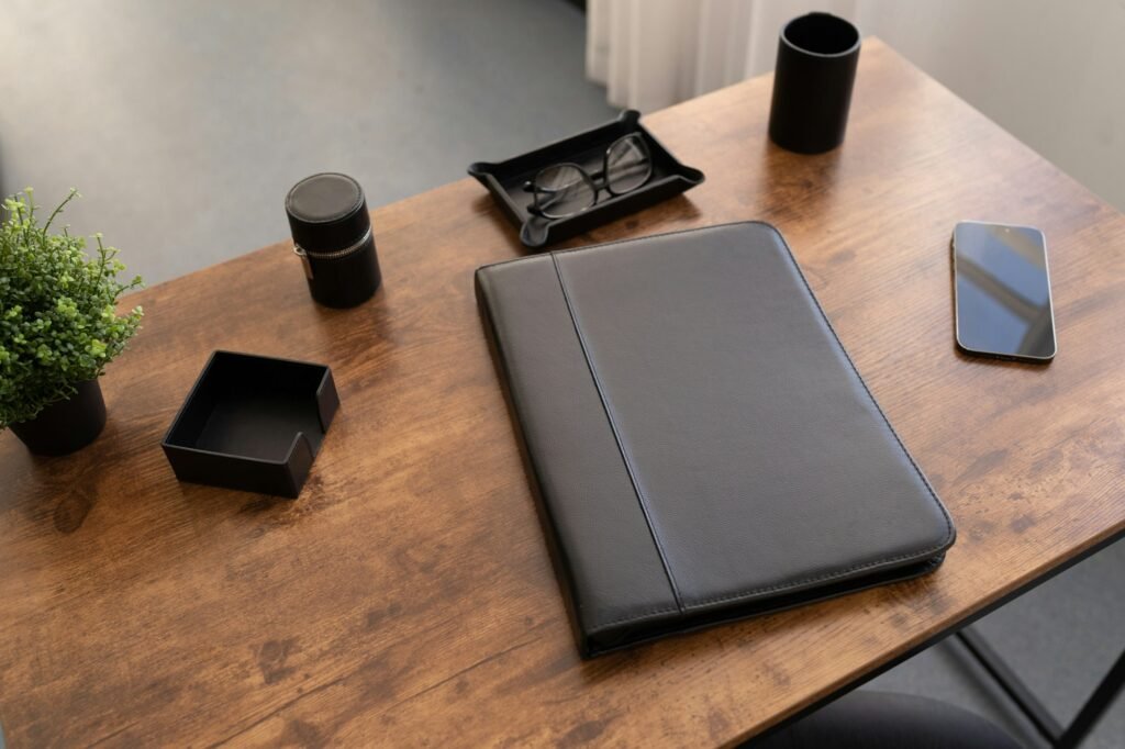 leather folder for documents on the desktop in the office