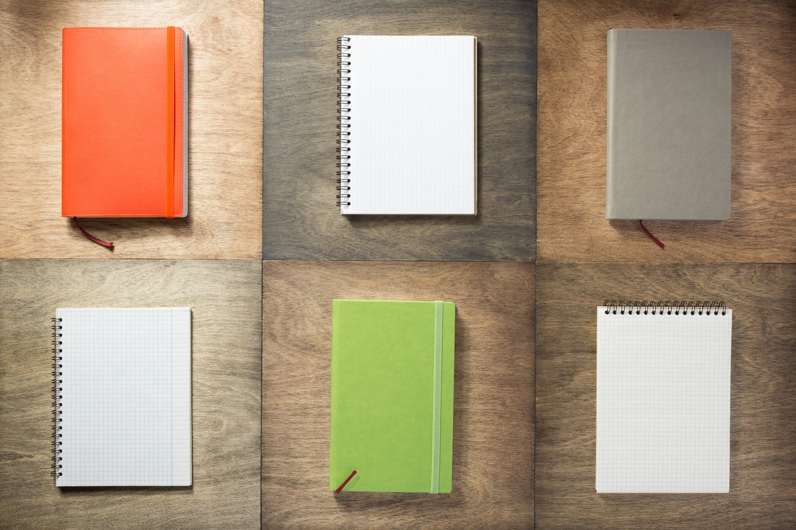 notebook at wooden background